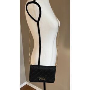 Bebe logo embossed black small crossbody/clutch with gold chain strap